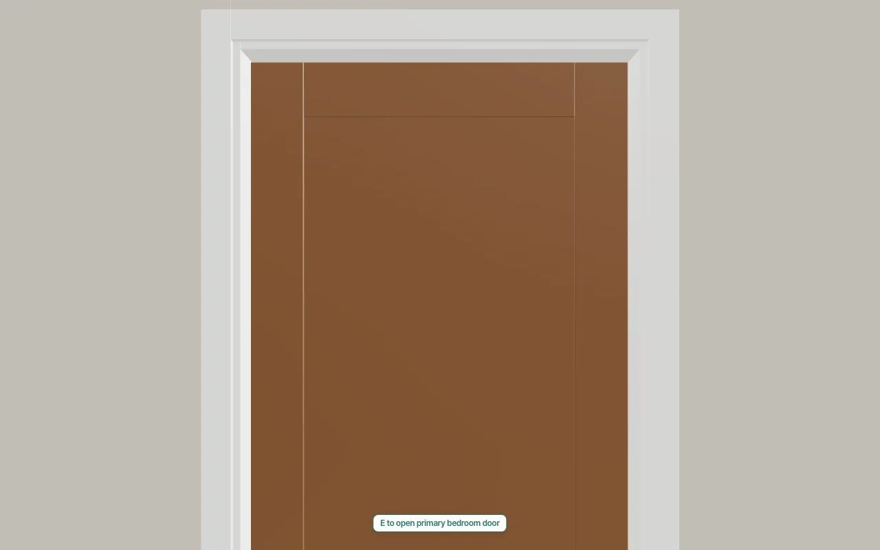 A stained shaker door to the primary bedroom, shut, with the E to open chip