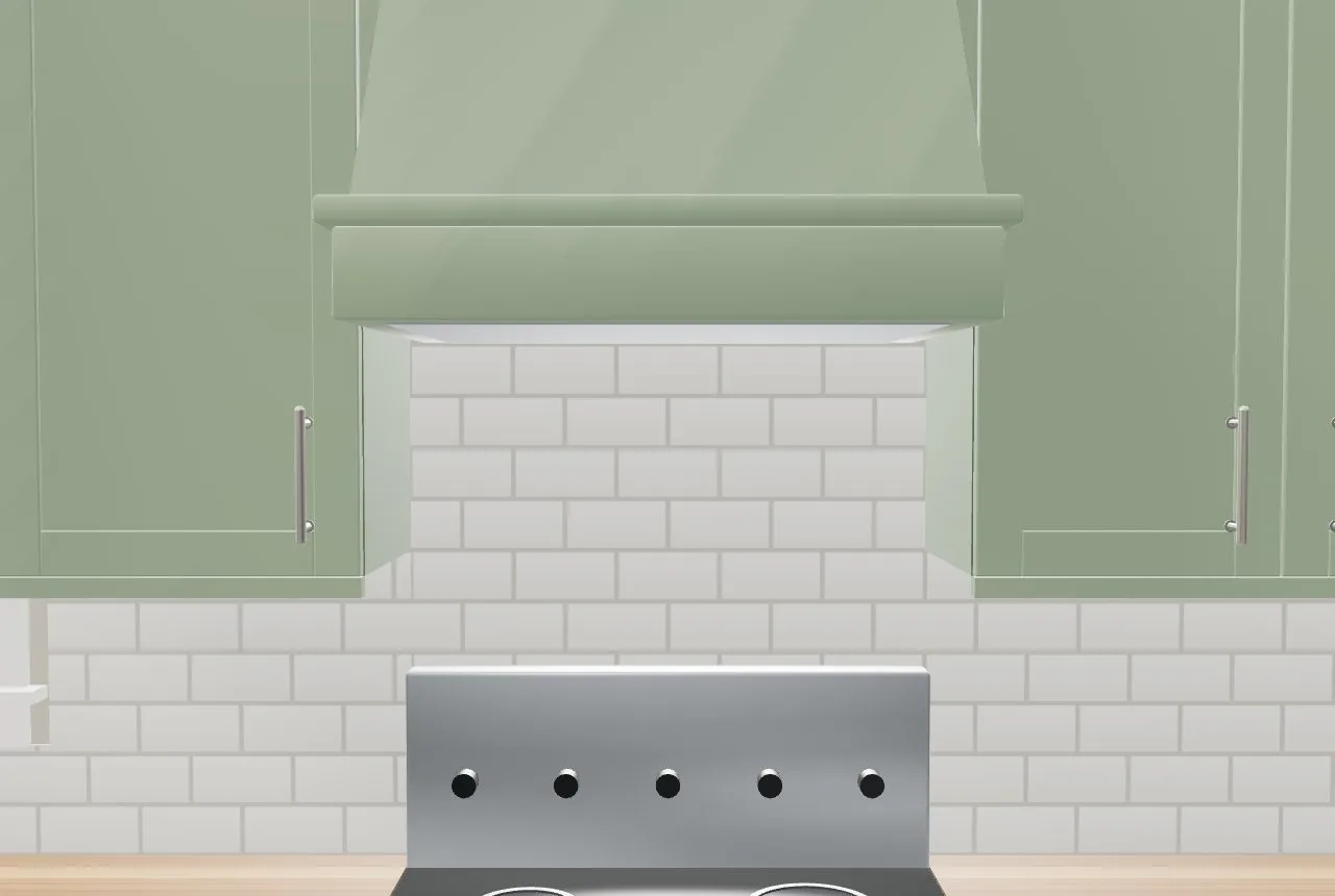 A wood hood painted with the cabinets over the range